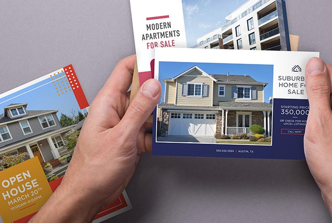 A person holding mailpieces including modern apartments for sale and suburban homes for sale.
