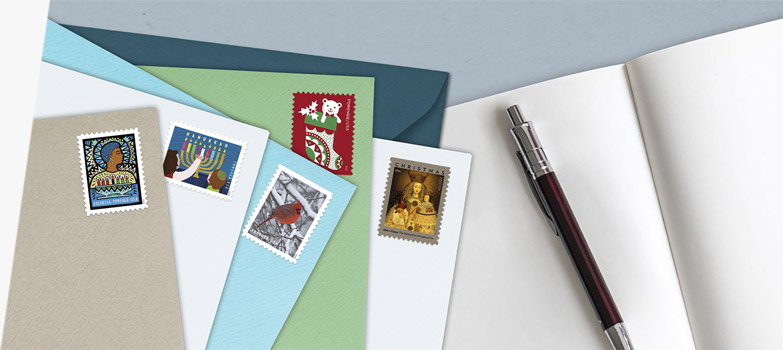 Envelopes with First-Class Mail Forever® holiday stamps for Kwanzaa, Hanukkah, Christmas, and more.