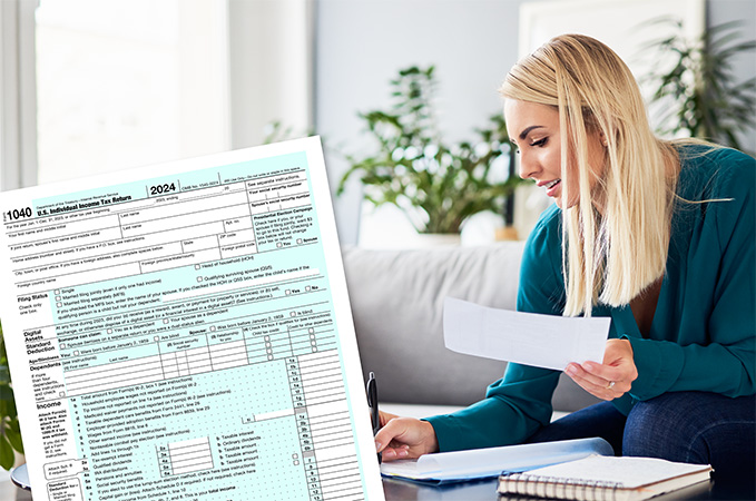 An IRS form 1040 and a person sitting at a table filling out forms.