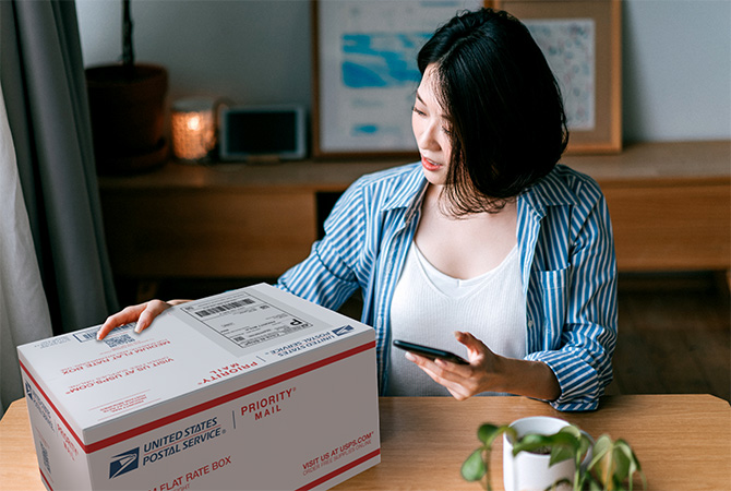 Person printing a Click-N-Ship label for a Priority Mail package.