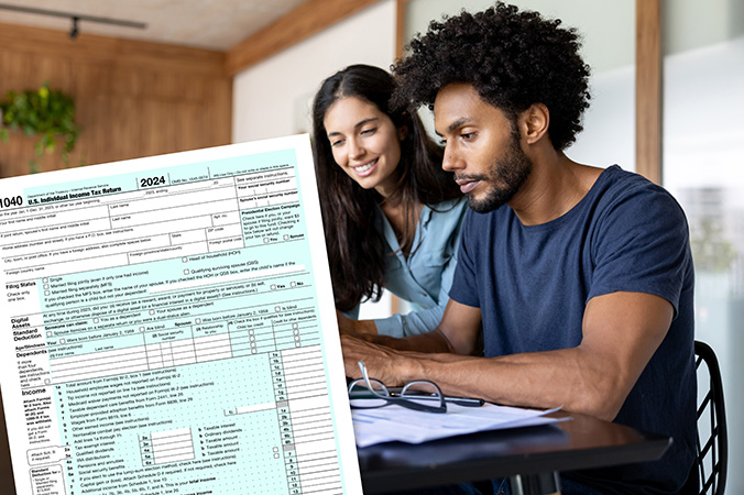 An IRS form 1040 and two people sitting at a desk filling out forms.